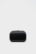 The Olga Berg Black Ada Crystal Bow Clutch is a rectangular black evening bag with a crystal-embellished, silver-toned clasp—combining sophistication and elegance for any occasion.