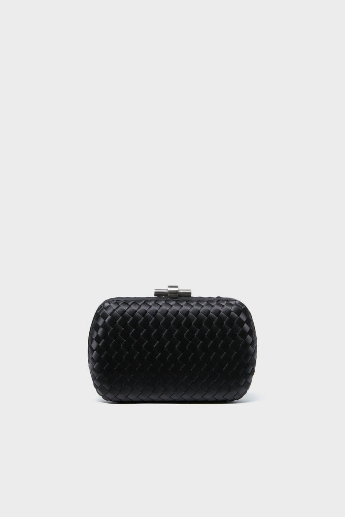 The Olga Berg small black woven clutch features a metallic clasp, making it perfect as an evening bag or a special occasion accessory.