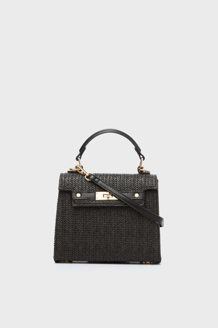 Urban Expressions features a black textured vegan handbag with a top handle, gold hardware, and a detachable shoulder strap.