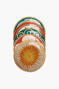 A stack of five La DoubleJ Italian porcelain mini plates, featuring vibrant geometric and mosaic patterns with elegant 18k gold rims, viewed from above.