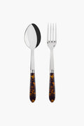 A Sabre Paris serving set featuring a stainless steel spoon and fork with glossy, brown tortoise handles, arranged side by side for a stylish touch.