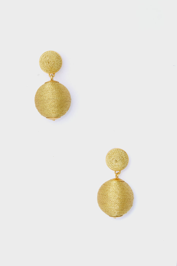 A pair of elegant, hypoallergenic gold lantern earrings from Tuckernuck Jewelry.