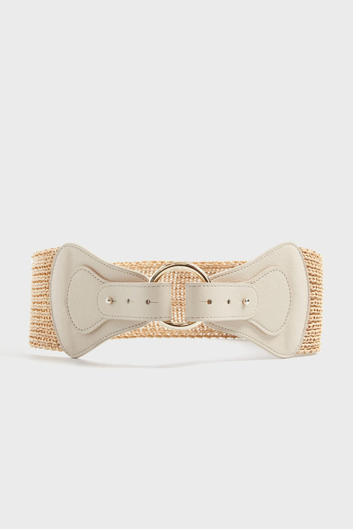 The B-Low the Belt wide woven straw belt features a beige genuine leather front panel, two decorative buckles, and an elastic back for an adjustable fit.
