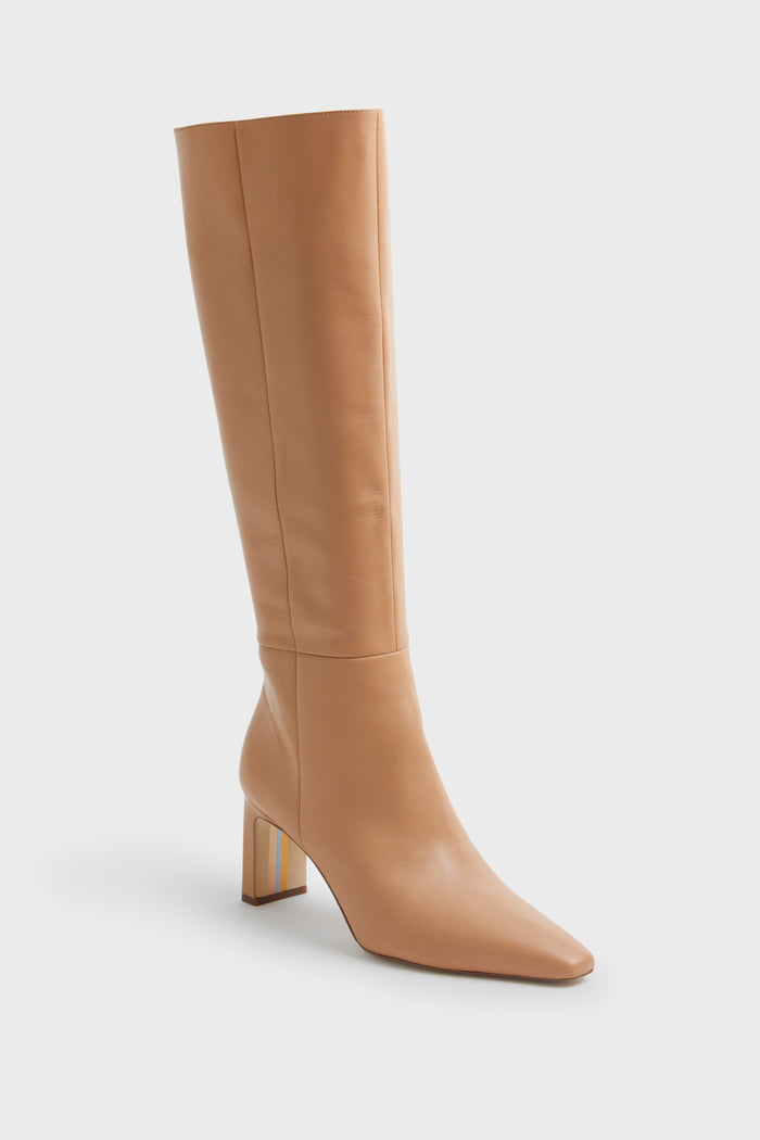 The Sam Edelman tan knee-high leather boot features a block heel and pointed toe, highlighting the luxe style of pointed toe boots.