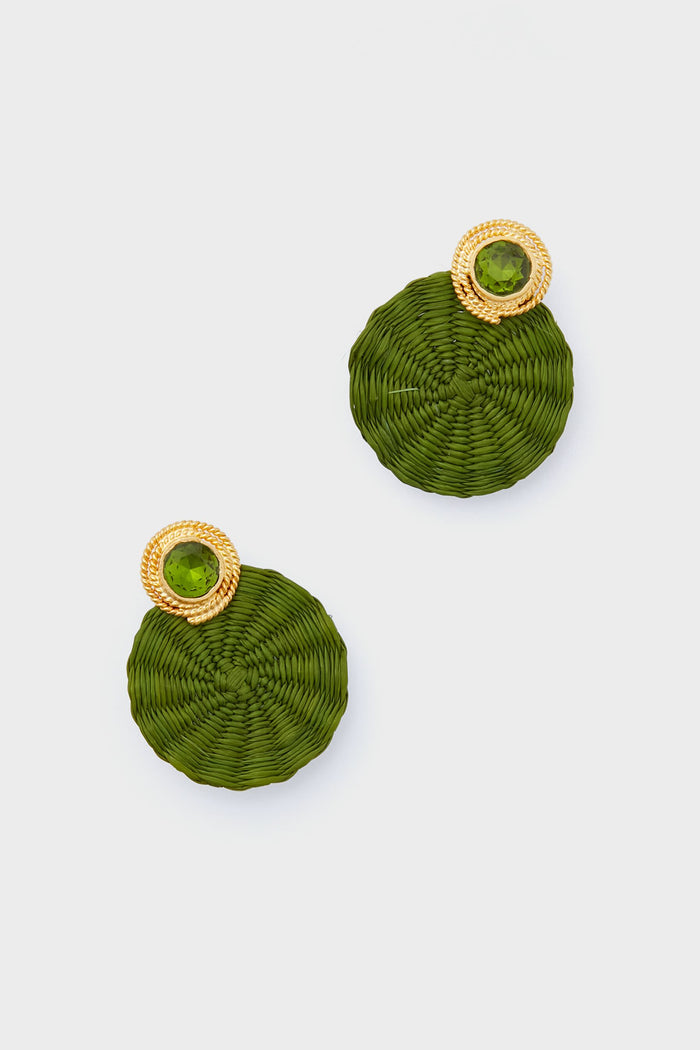 Ana Carolina Valencia green woven iraca palm earrings with gold-plated studs and green gemstones, showcasing handmade jewelry details.