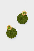 Ana Carolina Valencia green woven iraca palm earrings with gold-plated studs and green gemstones, showcasing handmade jewelry details.