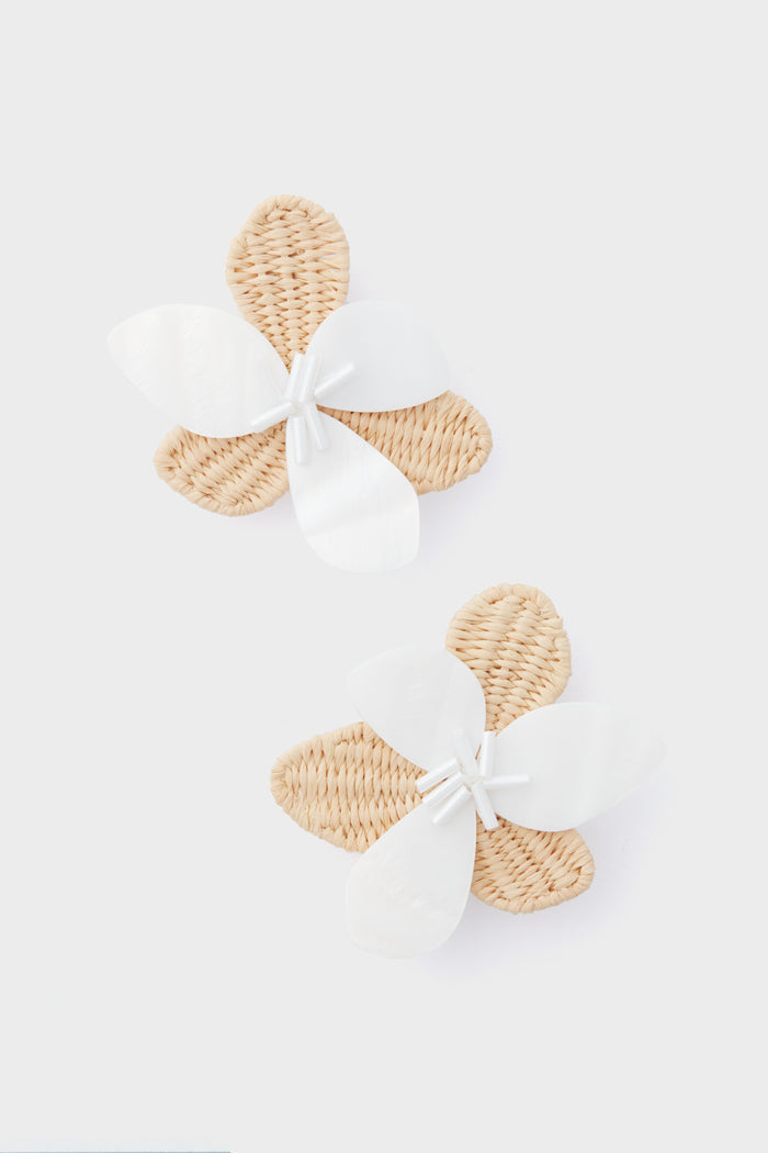 Two elegant flower earrings by Tuckernuck Jewelry feature woven beige petals and lustrous Mother of Pearl accents, creating a decorative floral design.