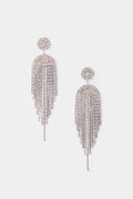 A pair of Petit Moments silver crystal chandelier earrings featuring round jeweled tops and cascading rhinestone strands—the perfect party jewelry.
