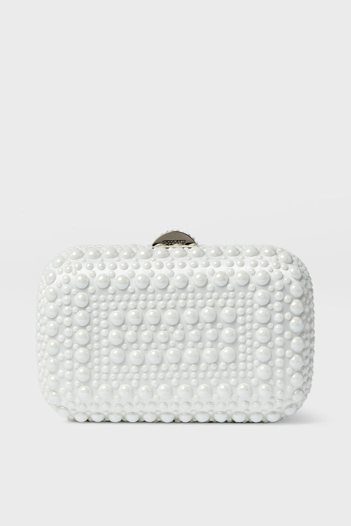 The Olga Berg rectangular white clutch, featuring a textured pattern of raised round beads, is an elegant choice for evening bags and special occasions.